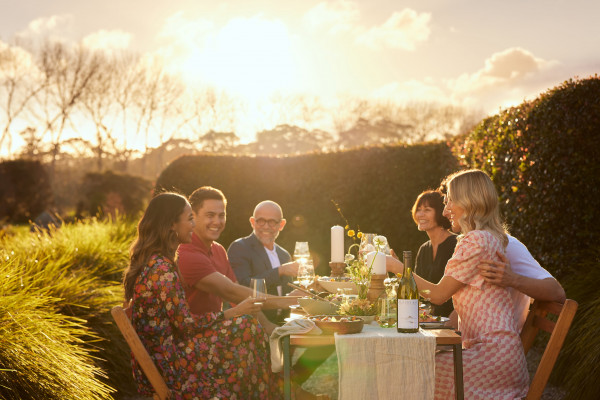 friends enjoying wine at dinner