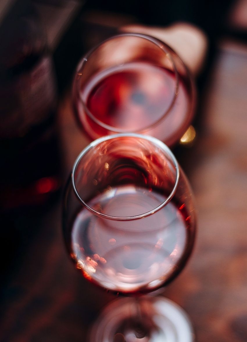 Red wine poured into a glass